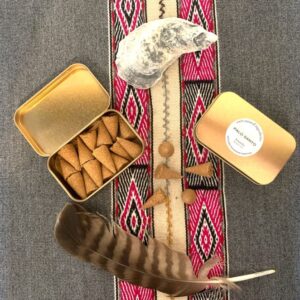 15 palo santo incense cones with rose gold tin container. Andean colorful cloth. Feather and shell